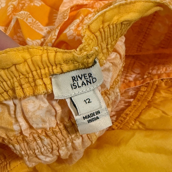 River Island Mustard Patterned Halter Jumpsuit - Picture 2 of 2